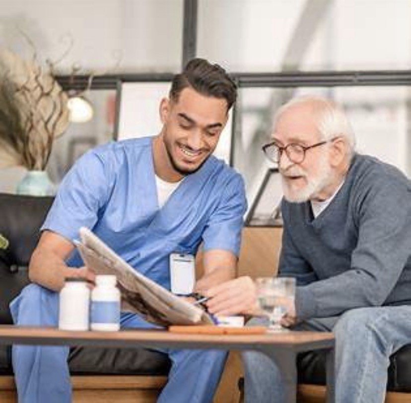 Caregiver supporting an older gentleman